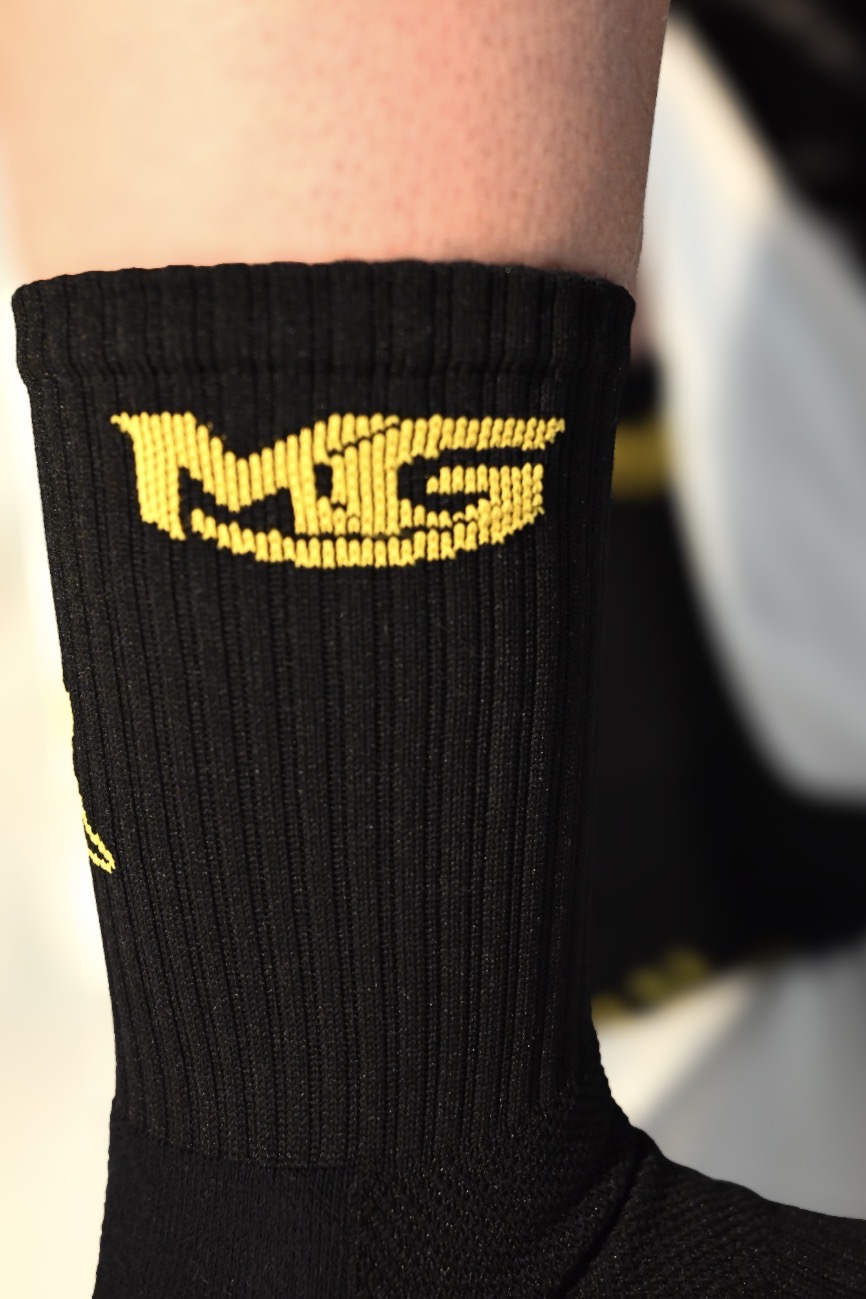 Logo MG brodé sur la chaussette MoveGrip